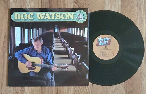 Doc watson riding the - -,
